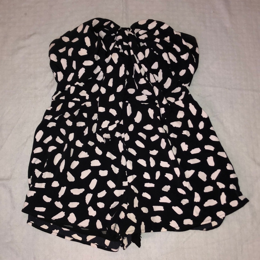 Black with white polka dots, romper by Blue Blush